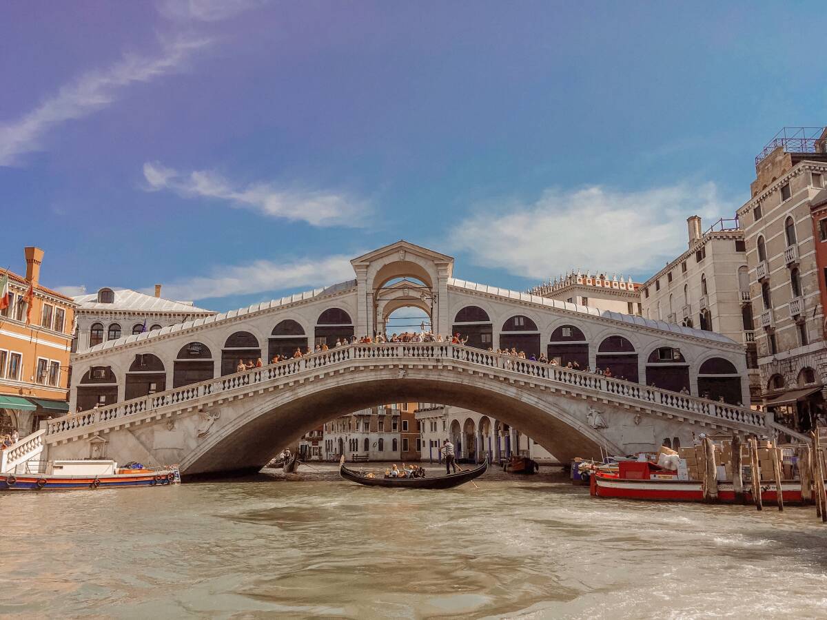 The Rialto Bridge in Venice, Italy is a popular destination for traveling photographers.