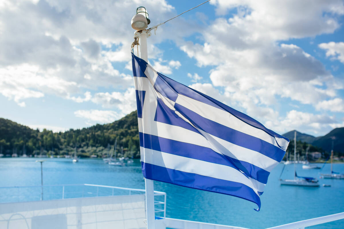 View of the Greek flag on the water