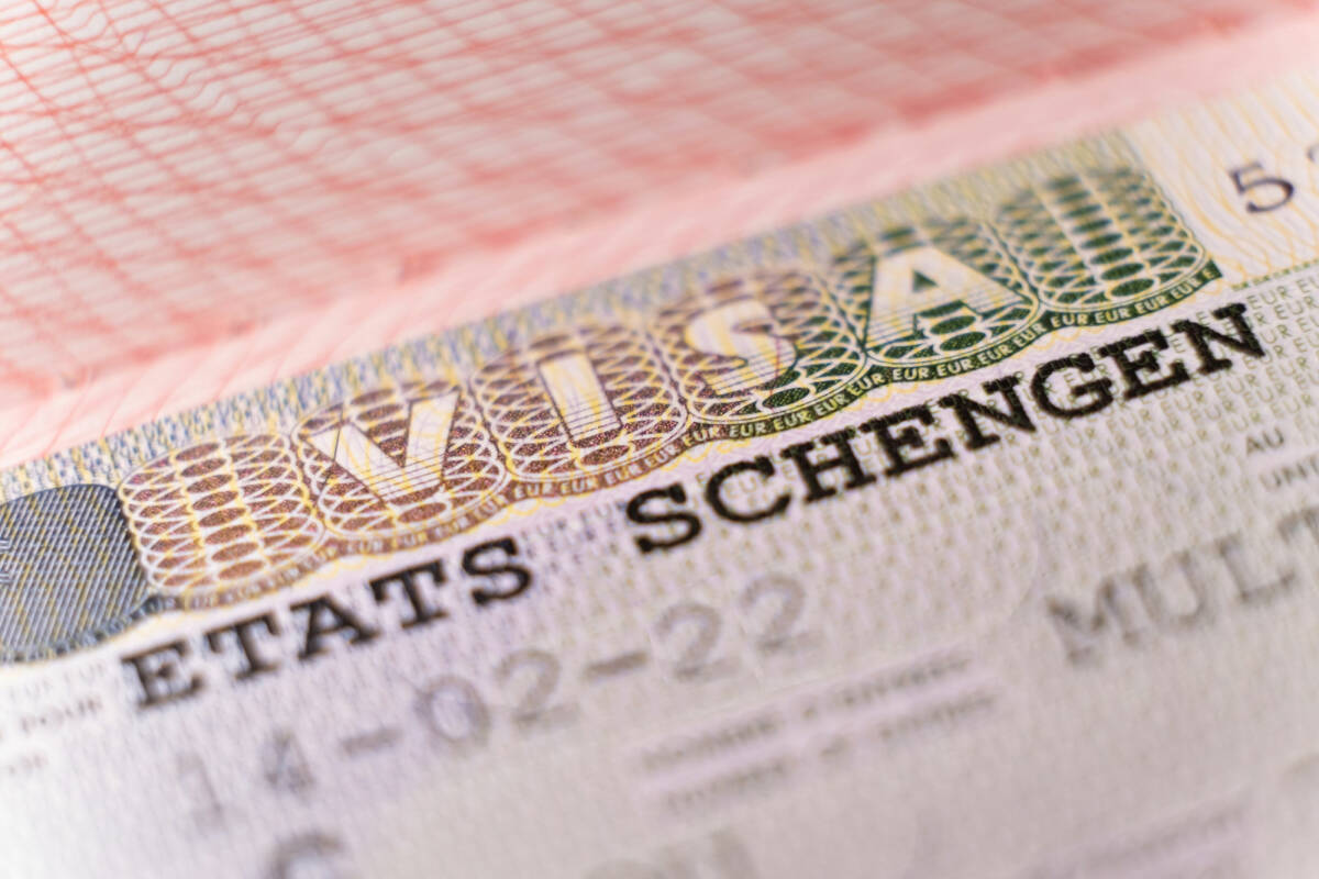 Image of a biometric passport with Schengen visa