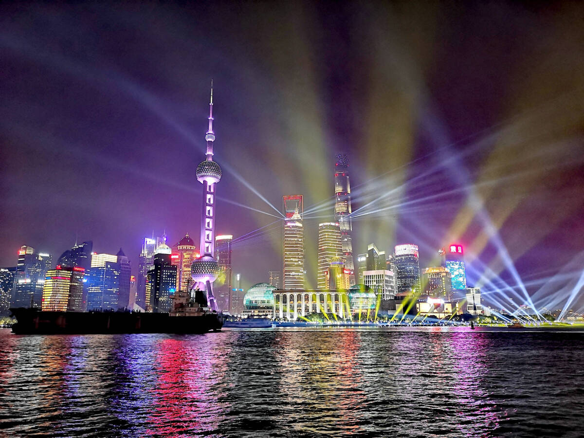 View of Shanghai cityscape with light at nighttime.