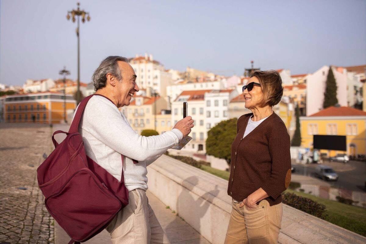 A couple enjoying their time in Lisbon, Portugal, protected by travel insurance for a worry-free experience.